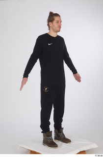 Arvid black joggers black long sleeve t shirt brown shoes…